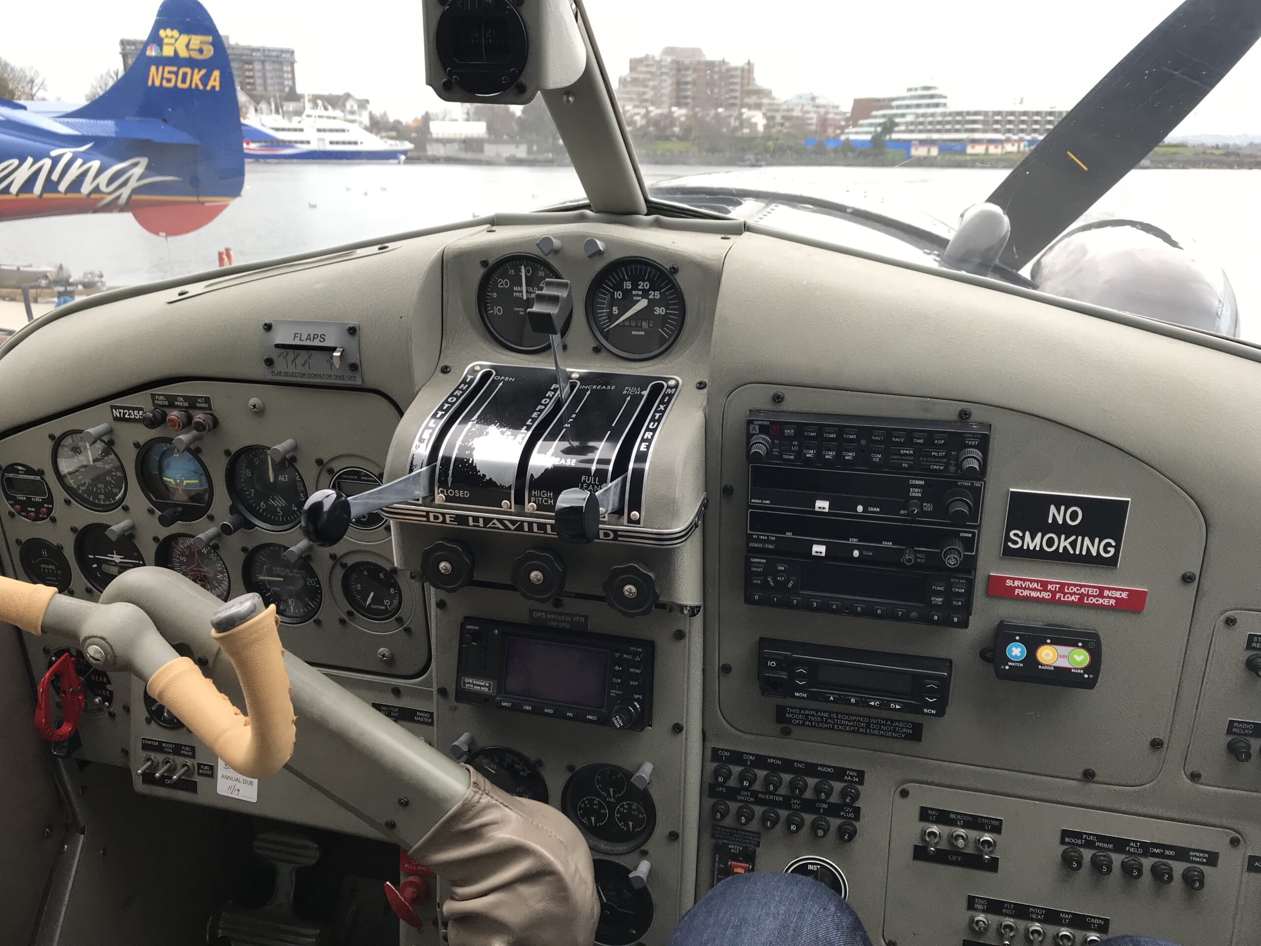 De Havilland floatplane cockpit view over Victoria Inner Harbour